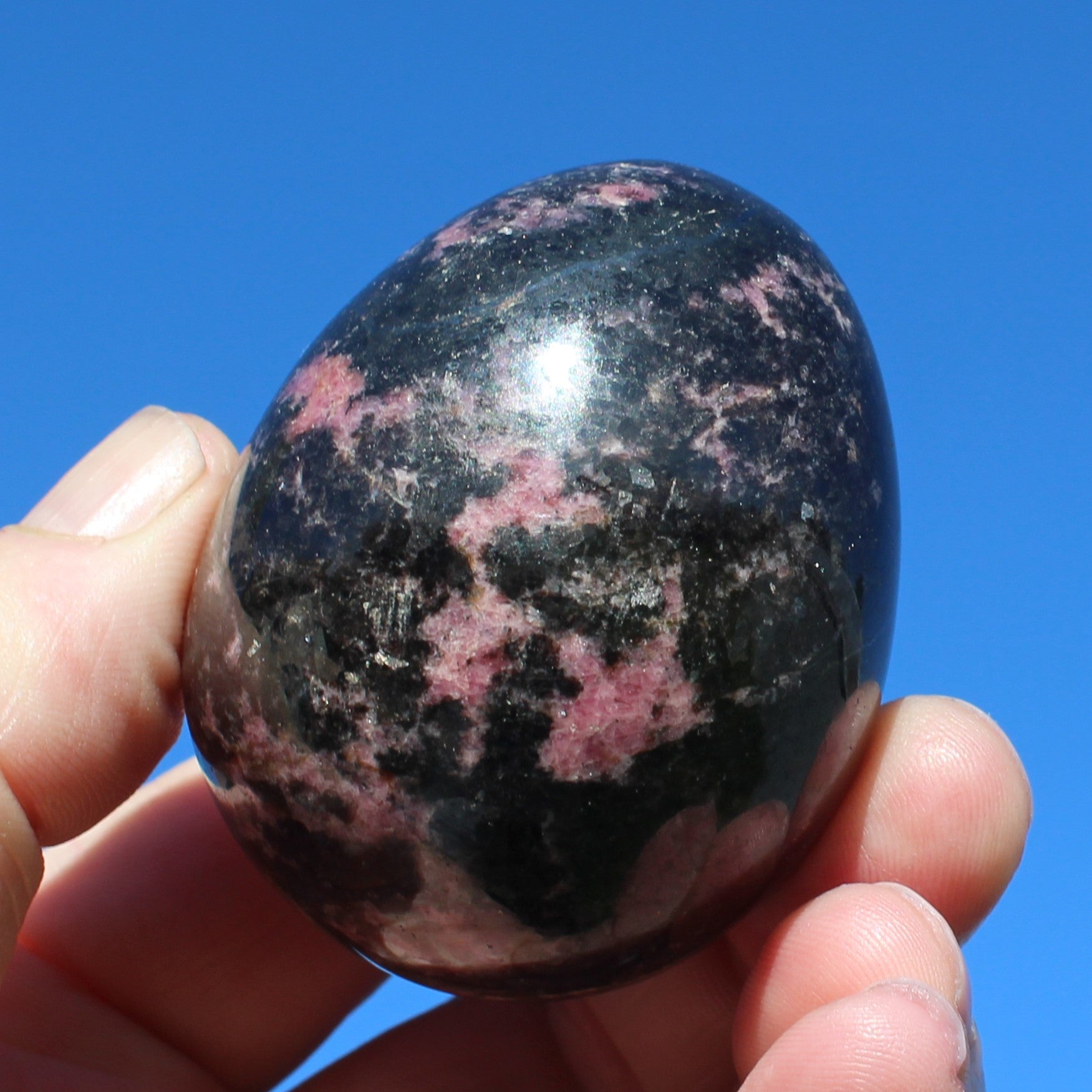 Rhodonite egg 248g Rocks and Things