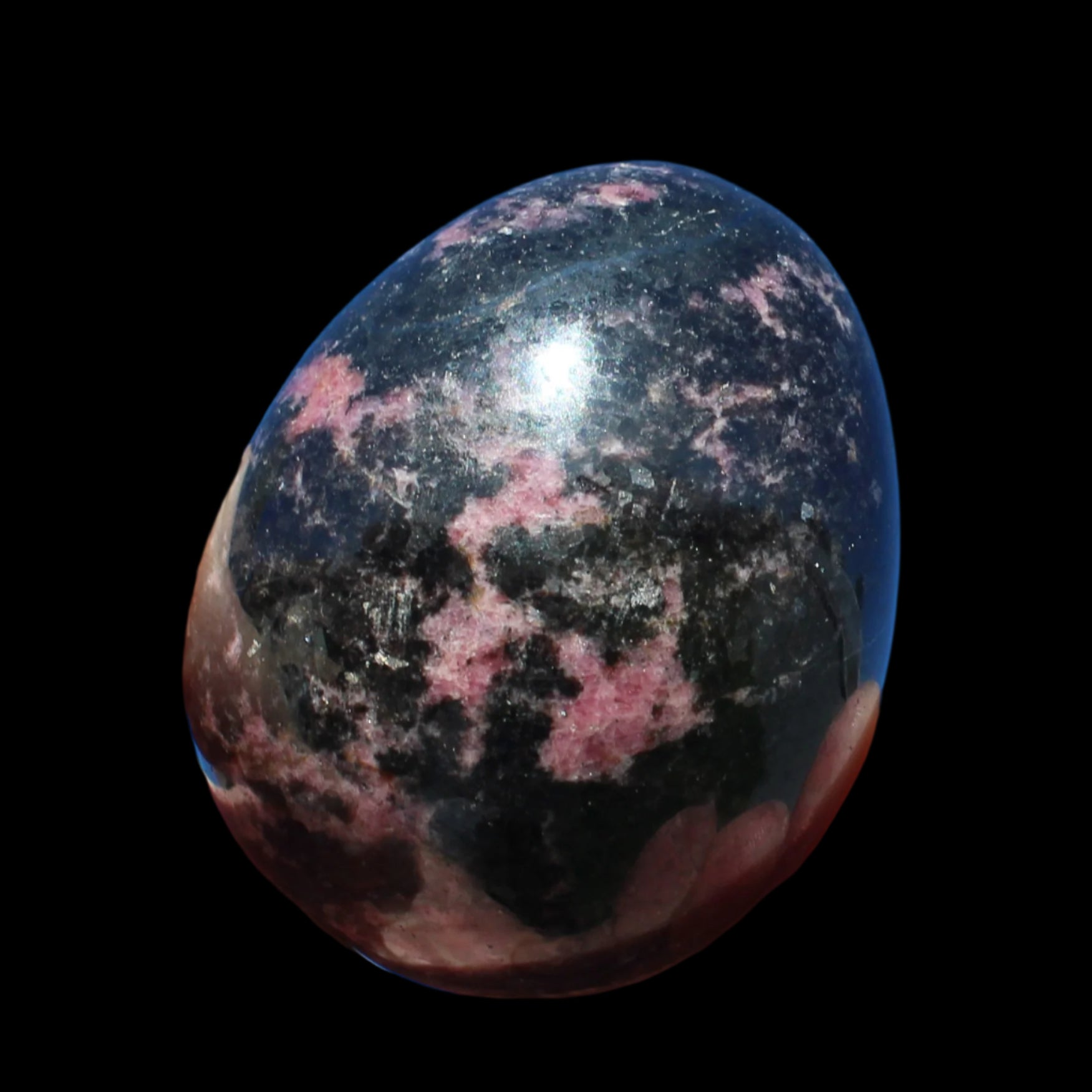 Rhodonite egg 248g in sunlight - Rocks and Things Store