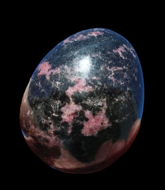 Rhodonite egg 248g in sunlight - Rocks and Things Store