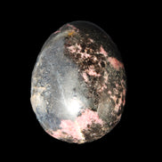 Rhodonite egg 248g in sunlight - Rocks and Things Store