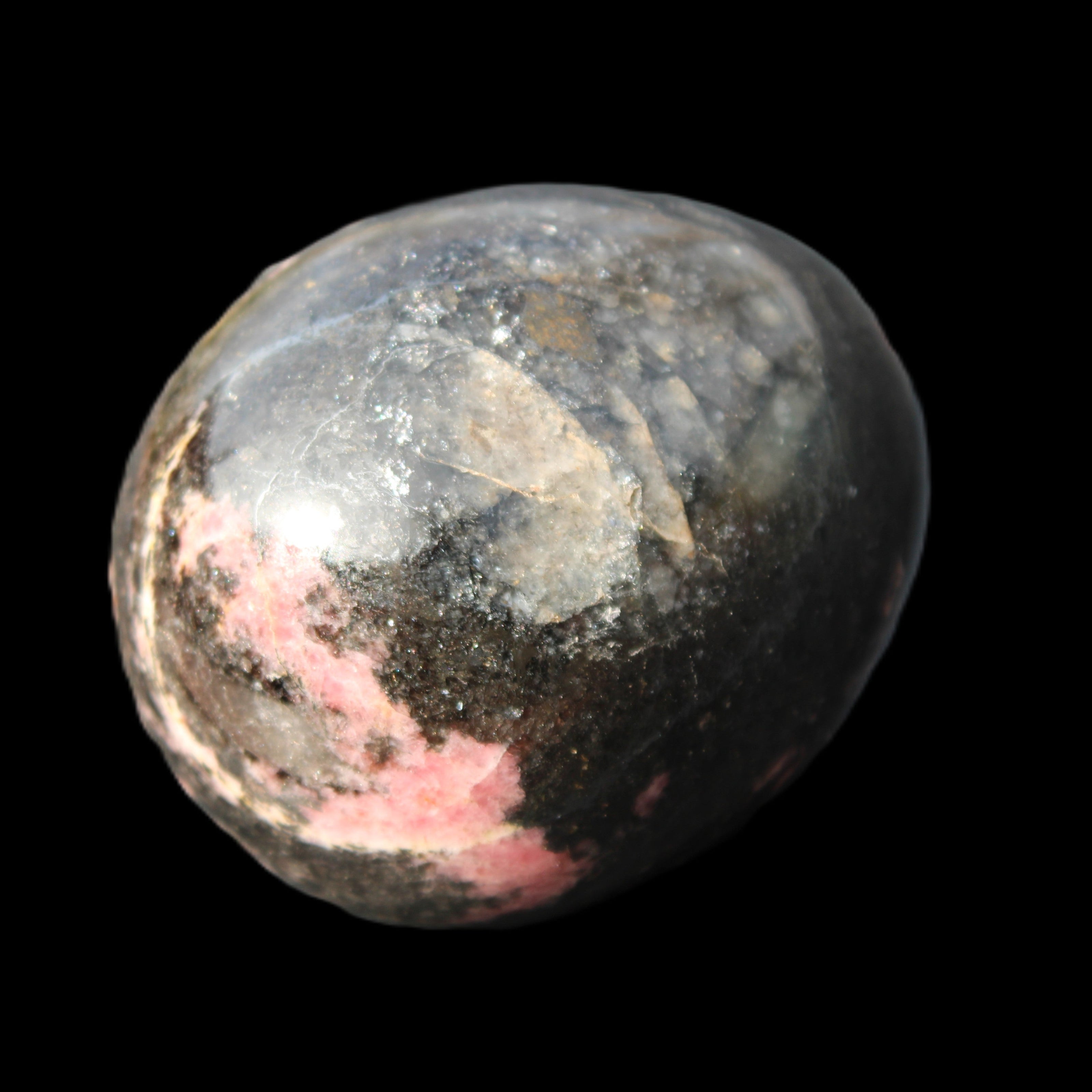 Rhodonite egg 248g in sunlight - Rocks and Things Store