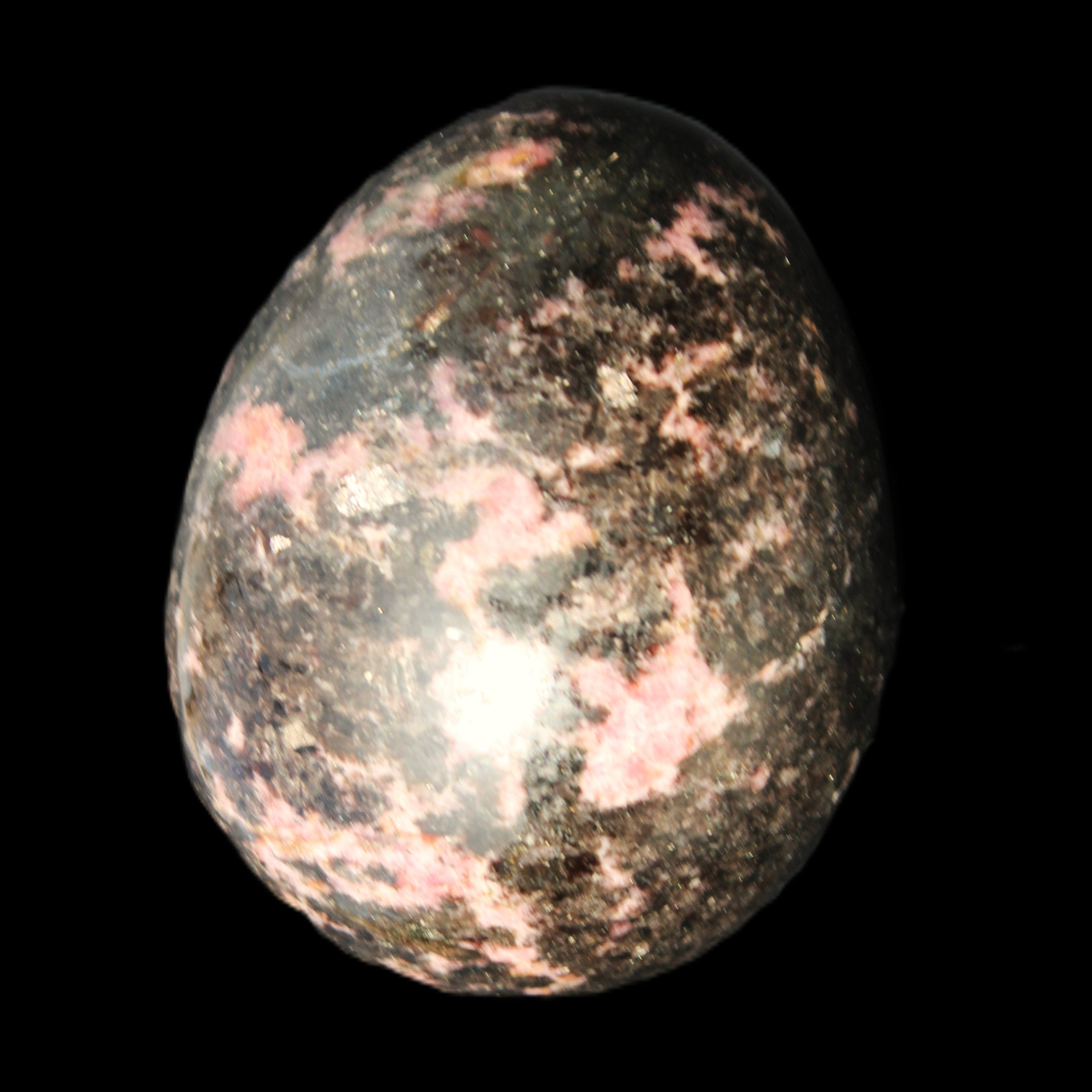 Rhodonite egg 248g in sunlight - Rocks and Things Store