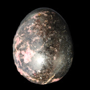 Rhodonite egg 248g in sunlight - Rocks and Things Store