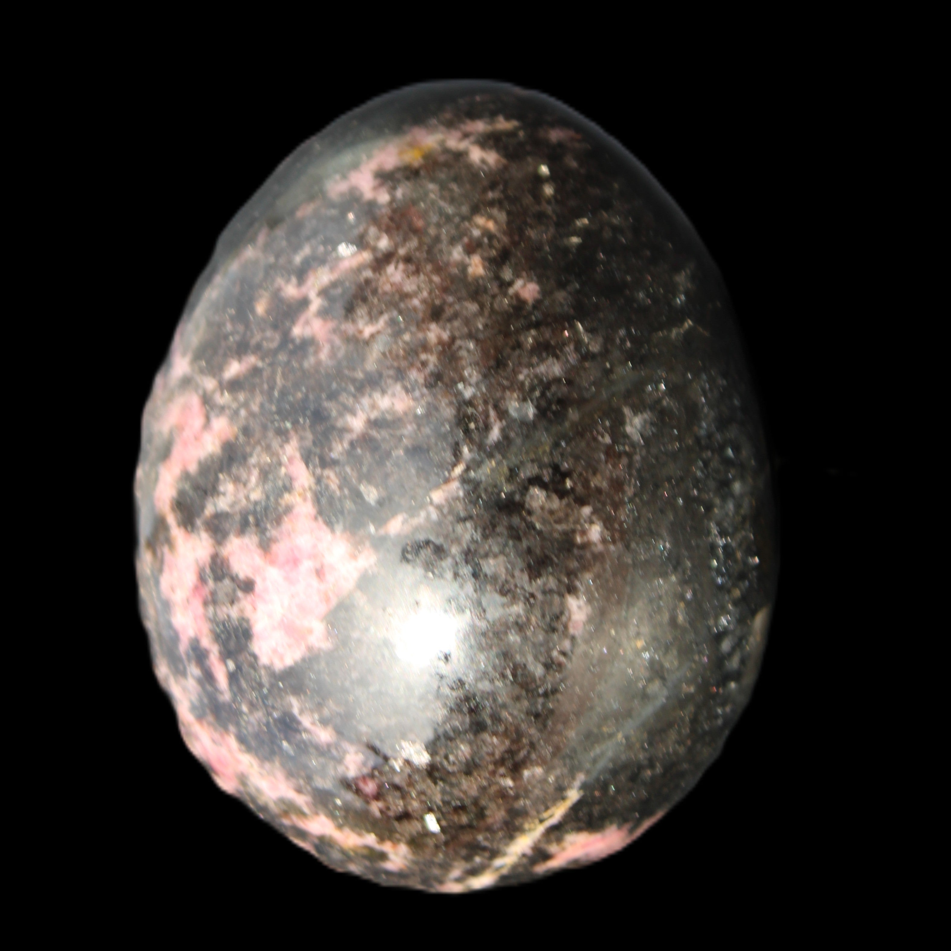 Rhodonite egg 248g in sunlight - Rocks and Things Store