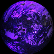 Ocean Moss Agate with geode cave sphere 4500g in UV light