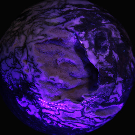 Ocean Moss Agate with geode cave sphere 4500g in UV light