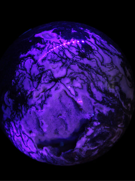 Ocean Moss Agate with geode cave sphere 4500g in UV light