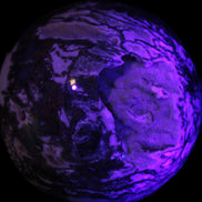 Ocean Moss Agate with geode cave sphere 4500g in UV light