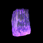 Amber Calcite phosphorescent crystal 127g in UV light - Rocks and Things Store