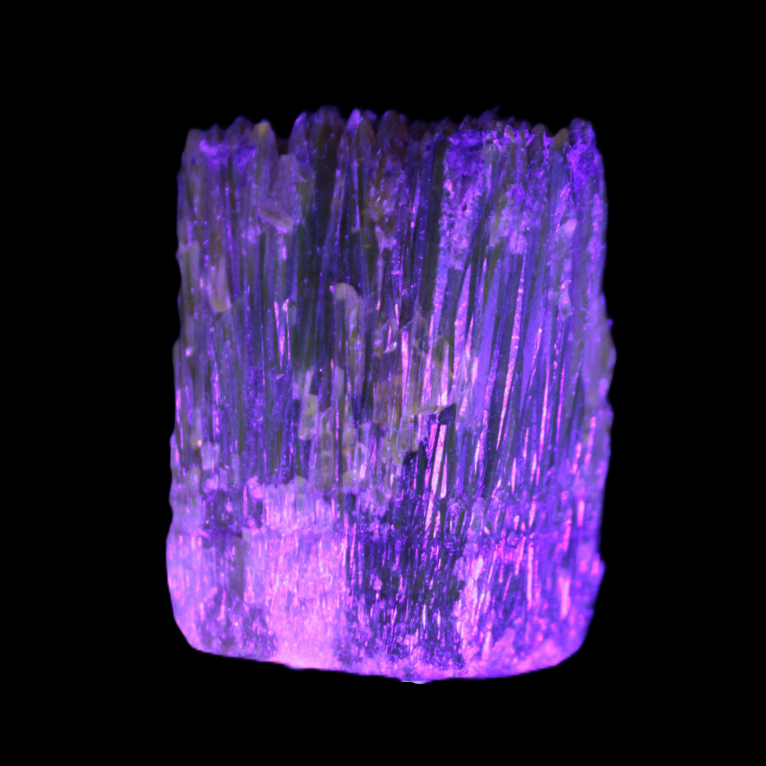 Amber Calcite phosphorescent crystal 127g in UV light - Rocks and Things Store