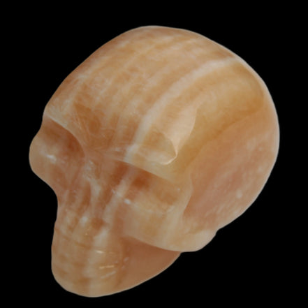 Banded Yellow Calcite skull 49mm 185.6g in sunlight - Rocks and Things Store