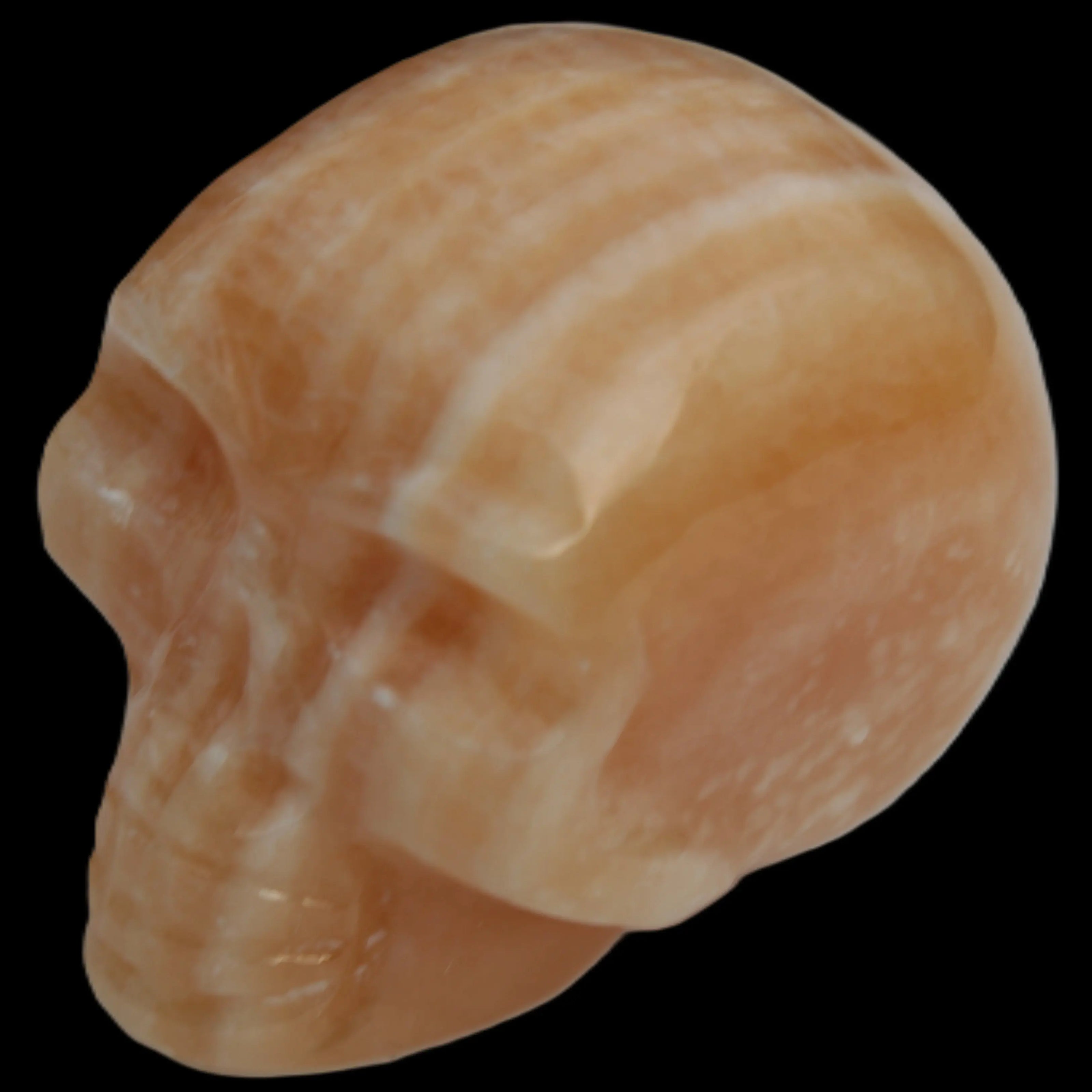 Banded Yellow Calcite skull 49mm 185.6g in sunlight - Rocks and Things Store