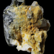 Black Tourmaline with Feldspar Quartz UV reactive matrix 88.2ct 17.7g in LED light -  Rocks and Things Store