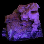 Black Tourmaline with Feldspar Quartz UV reactive matrix 88.2ct 17.7g in UV light -  Rocks and Things Store