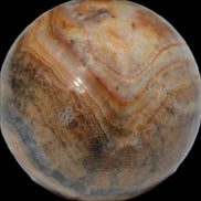 Bumblebee Calcite sphere 80g in sunlight - Rocks and Things Store