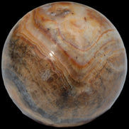 Bumblebee Calcite sphere 80g in sunlight - Rocks and Things Store