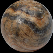 Bumblebee Calcite sphere 80g in sunlight - Rocks and Things Store