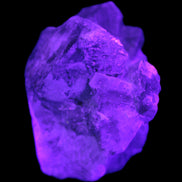 Calcite UV-reactive crystal cluster 100-165g Rocks and Things