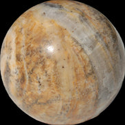 Calcite banded sphere 180g in sunlight - Rocks and Things Store