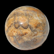 Calcite banded sphere 180g in sunlight - Rocks and Things Store