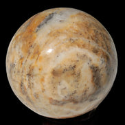 Calcite banded sphere 180g in sunlight - Rocks and Things Store
