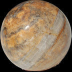 Calcite banded sphere 180g in sunlight - Rocks and Things Store