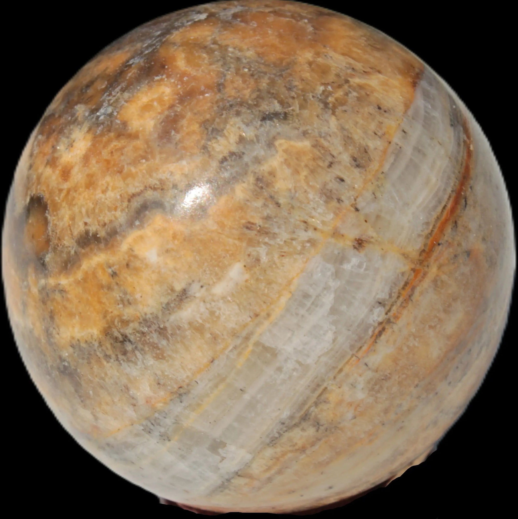 Calcite banded sphere 180g in sunlight - Rocks and Things Store
