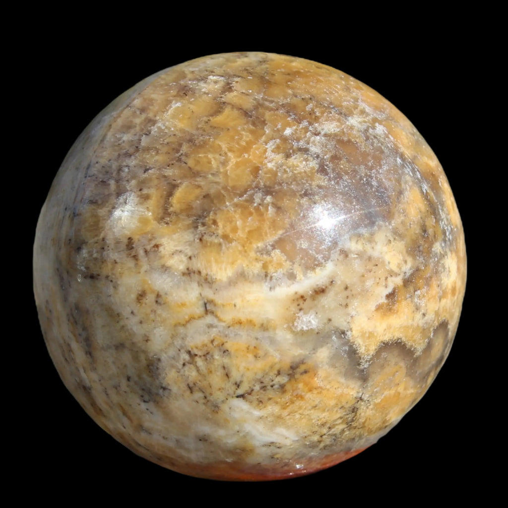 Calcite banded sphere 180g in sunlight - Rocks and Things Store