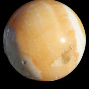 Calcite sphere 582g in sunshine - Rocks and Things Store
