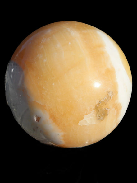 Calcite sphere 582g in sunshine - Rocks and Things Store
