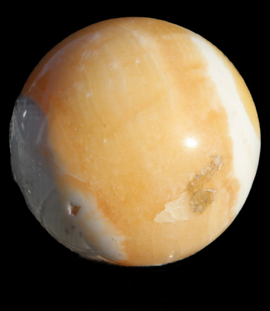 Calcite sphere 582g in sunshine - Rocks and Things Store