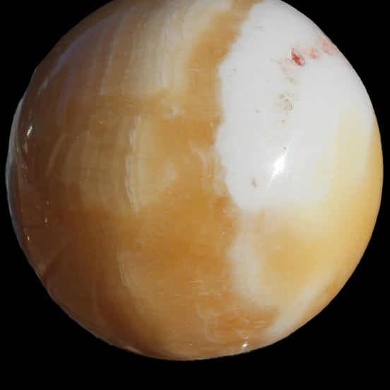 Calcite sphere 582g in sunshine - Rocks and Things Store