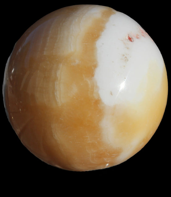 Calcite sphere 582g in sunshine - Rocks and Things Store