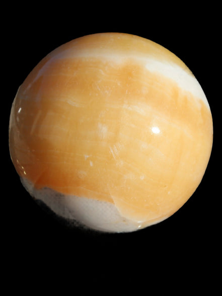 Calcite sphere 582g in sunshine - Rocks and Things Store