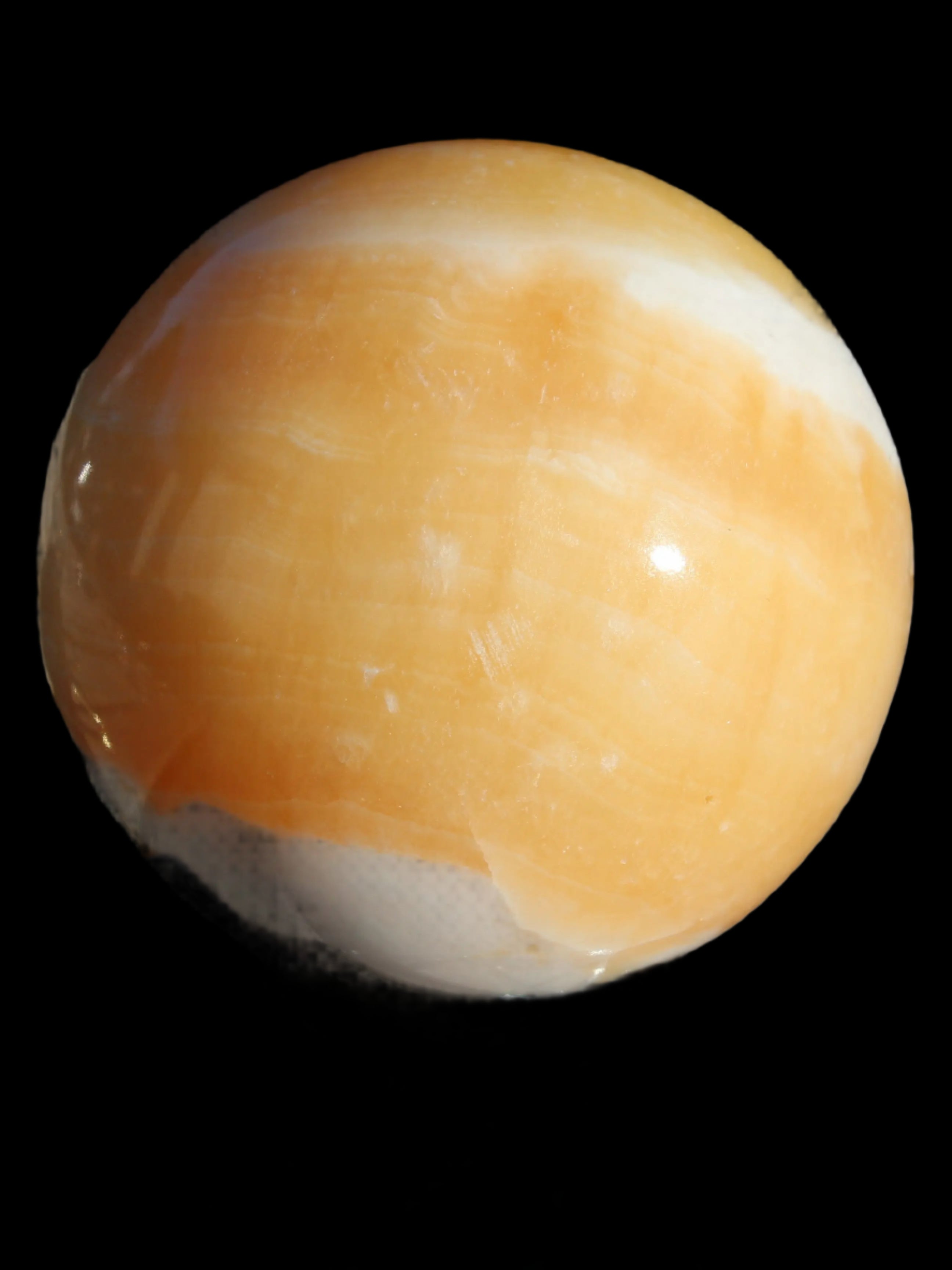 Calcite sphere 582g in sunshine - Rocks and Things Store