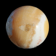 Calcite sphere 582g in sunshine - Rocks and Things Store