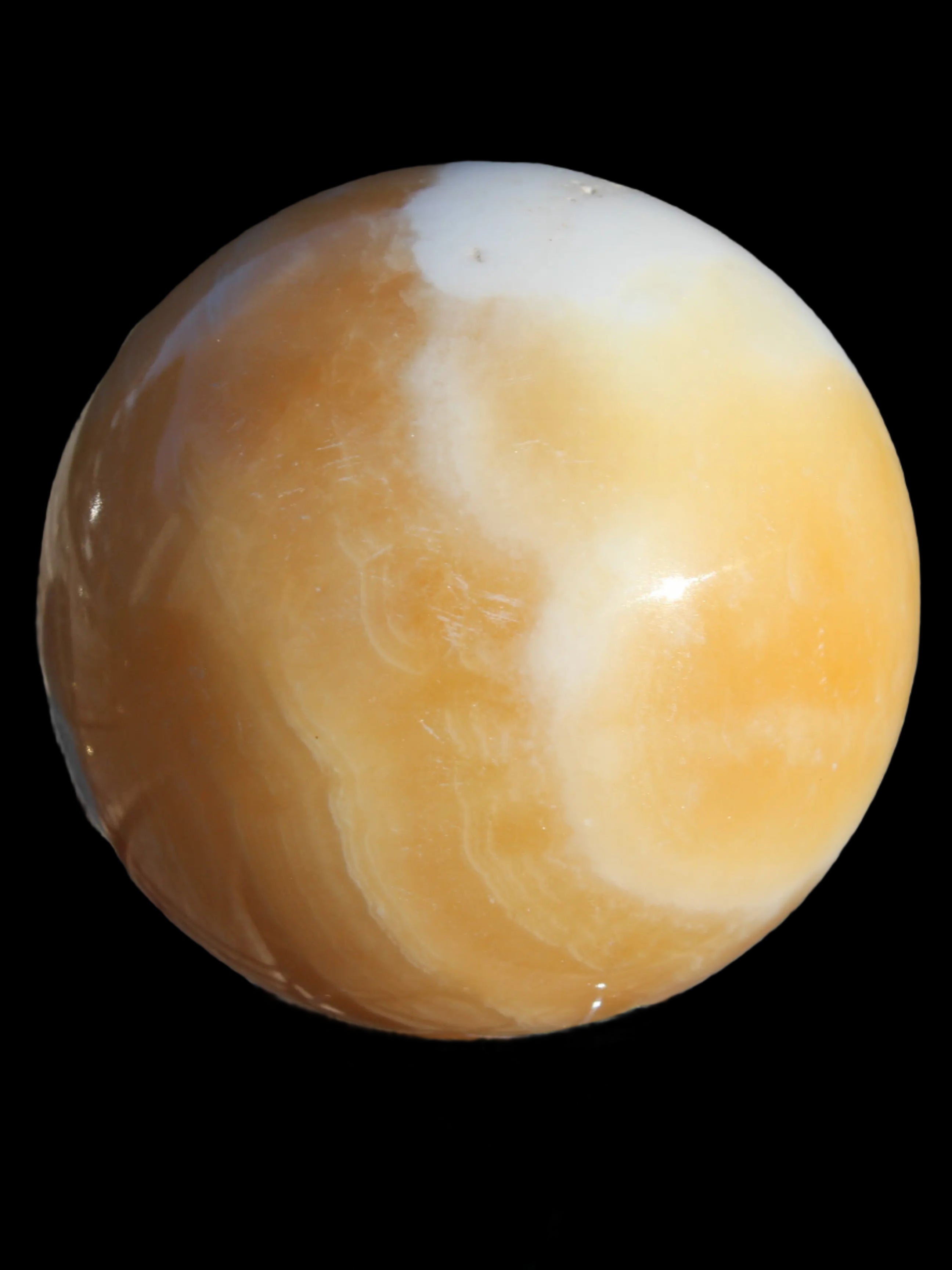 Calcite sphere 582g in sunshine - Rocks and Things Store