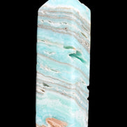 Aqua Blue Caribbean Calcite obelisk 292g in sunight - Rocks and Things Store