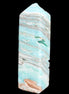 Aqua Blue Caribbean Calcite obelisk 292g in sunight - Rocks and Things Store