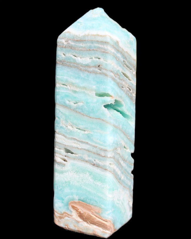 Aqua Blue Caribbean Calcite obelisk 292g in sunight - Rocks and Things Store