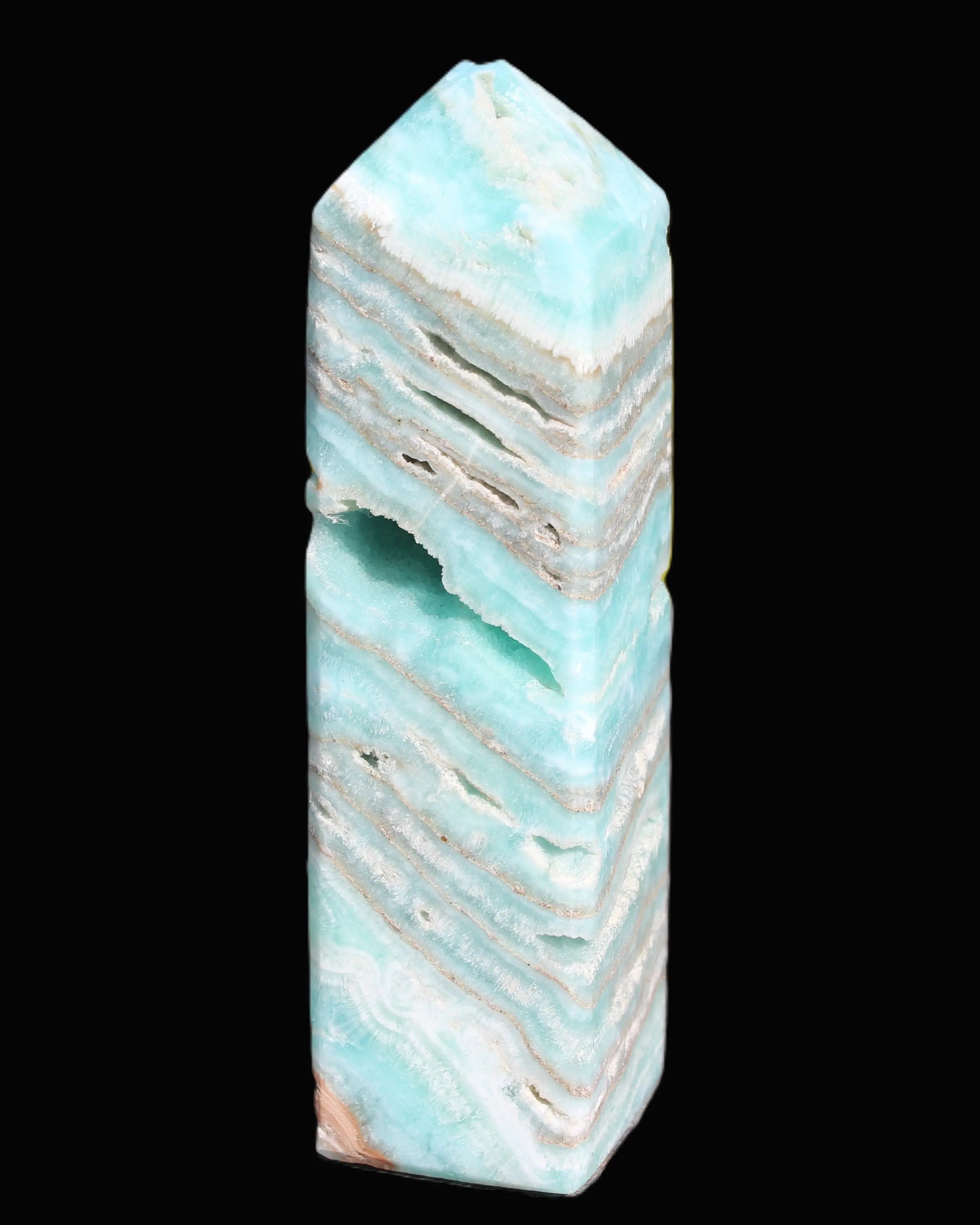 Aqua Blue Caribbean Calcite obelisk 292g in sunight - Rocks and Things Store