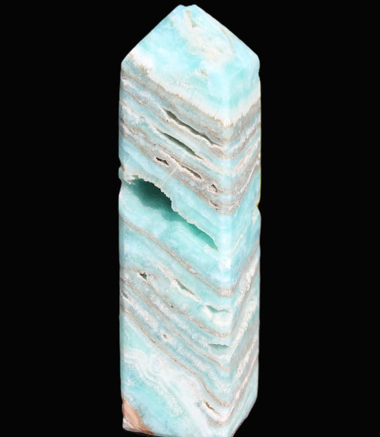 Aqua Blue Caribbean Calcite obelisk 292g in sunight - Rocks and Things Store