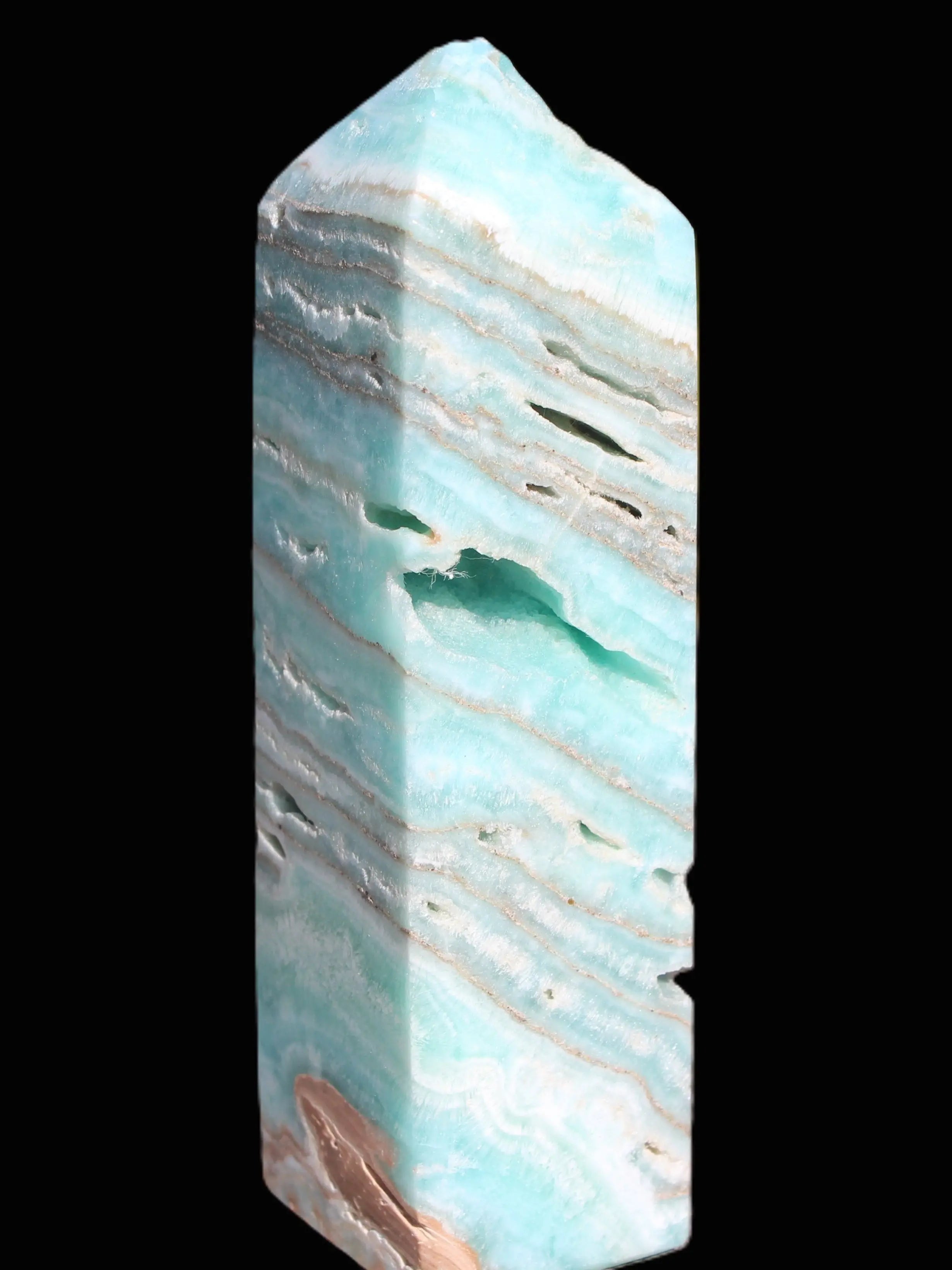 Aqua Blue Caribbean Calcite obelisk 292g in sunight - Rocks and Things Store