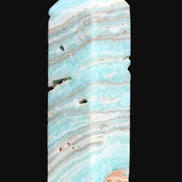Aqua Blue Caribbean Calcite obelisk 292g in sunight - Rocks and Things Store