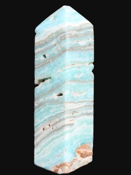 Aqua Blue Caribbean Calcite obelisk 292g in sunight - Rocks and Things Store