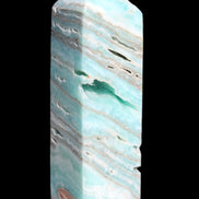 Aqua Blue Caribbean Calcite obelisk 292g in sunight - Rocks and Things Store