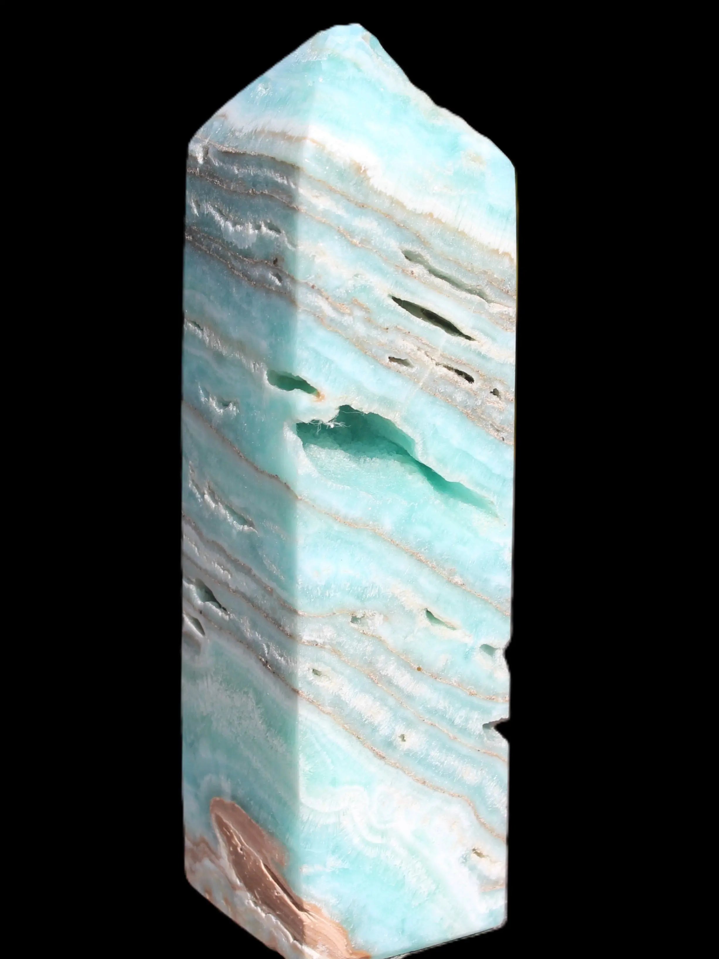 Aqua Blue Caribbean Calcite obelisk 292g in sunight - Rocks and Things Store
