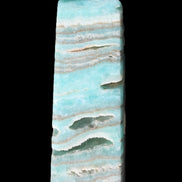 Aqua Blue Caribbean Calcite obelisk 292g in sunight - Rocks and Things Store