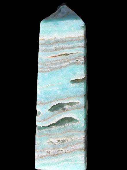 Aqua Blue Caribbean Calcite obelisk 292g in sunight - Rocks and Things Store
