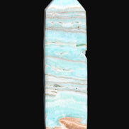Aqua Blue Caribbean Calcite obelisk 292g in sunight - Rocks and Things Store